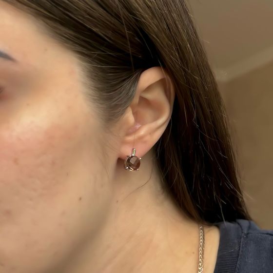 Silver earrings with 5.465 carats of sultanite