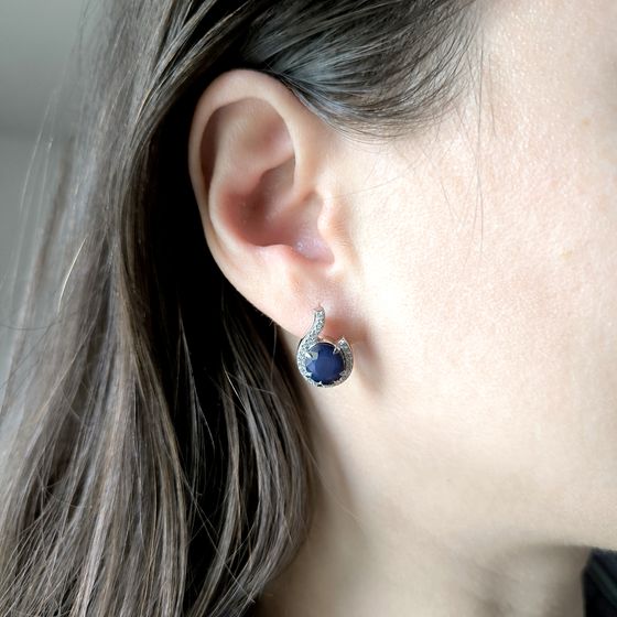 Sterling silver earrings with 7.667ct sapphire, pave diamonds