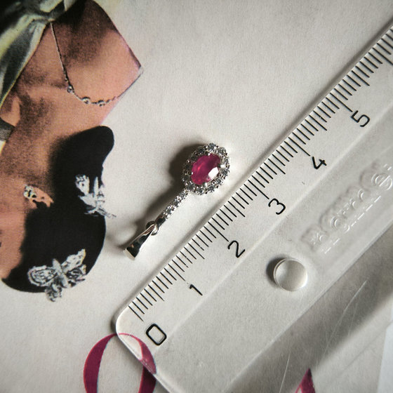 Silver pendant with a 1.113-carat ruby and cubic zirconia