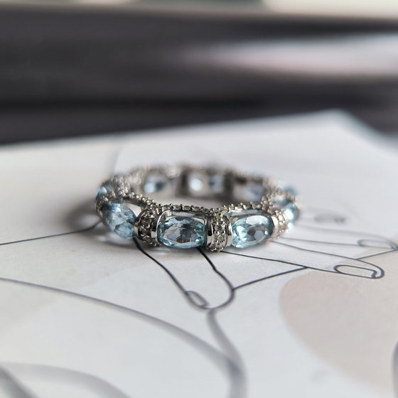 Silver ring with topaz 6.787ct, cubic zirconia
