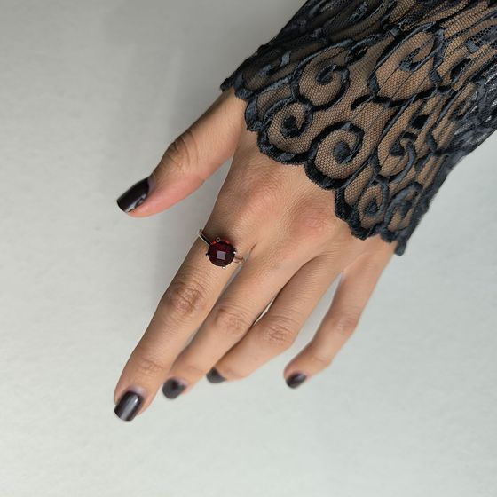 Silver ring with a garnet (nano)