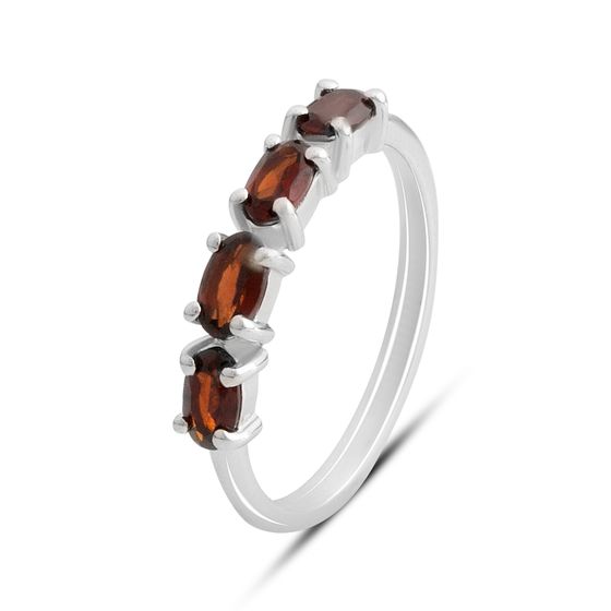 Silver ring with a garnet
