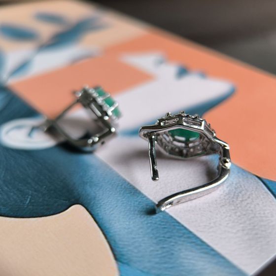 Silver earrings with emerald, fianites