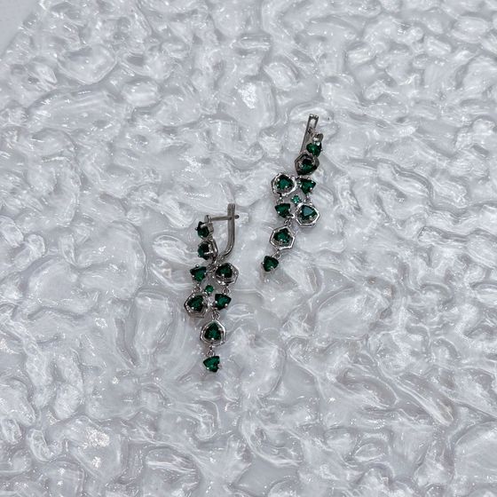 Silver earrings with a 3.452-carat nano emerald