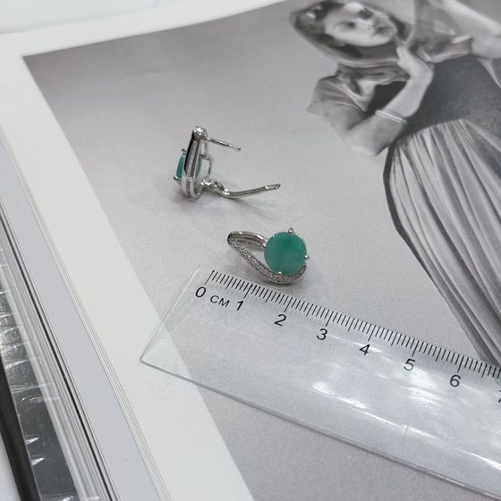 Silver earrings with emerald, fianites