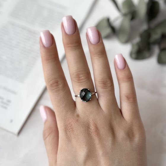 Silver ring with a London Blue topaz