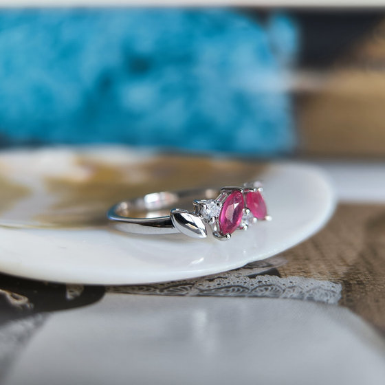 Silver ring with ruby and cubic zirconia