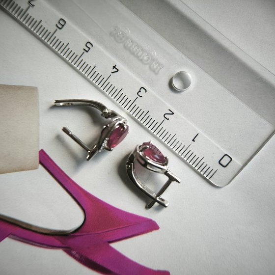 Silver earrings with a 3.31-carat ruby and cubic zirconia