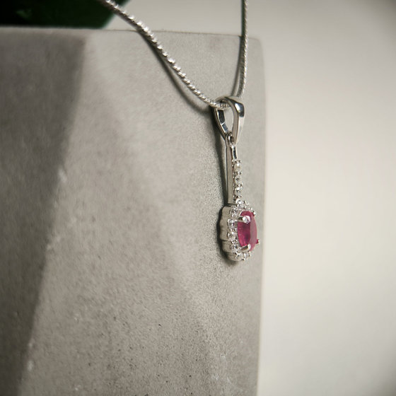 Silver pendant with a 1.113-carat ruby and cubic zirconia