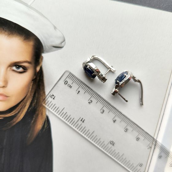 Sterling silver earrings with 7.667ct sapphire, pave diamonds