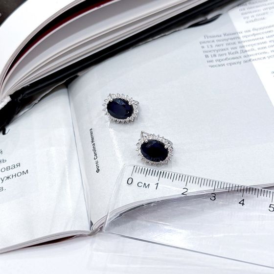 Silver earrings with a 7.199-carat sapphire and cubic zirconia