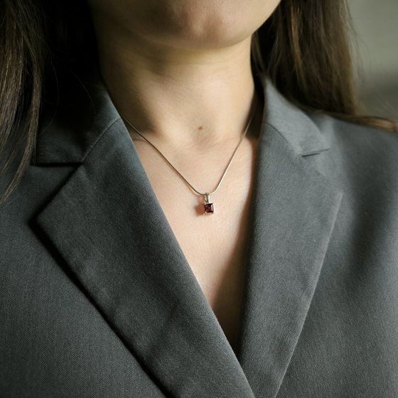 Silver pendant with a 0.923-carat garnet