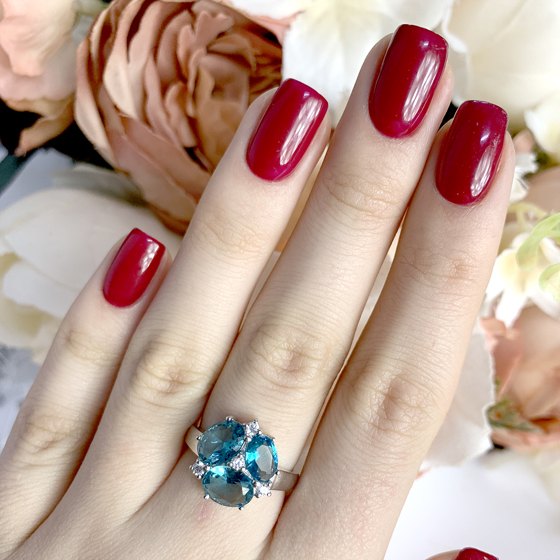 Silver ring with a London Blue topaz