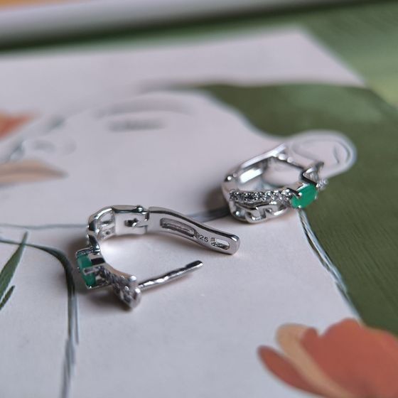 Silver earrings with emerald, fianites