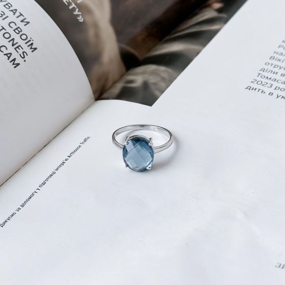 Silver ring with a London Blue topaz