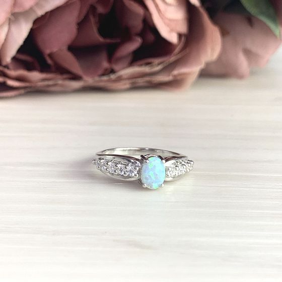 Silver ring with opal