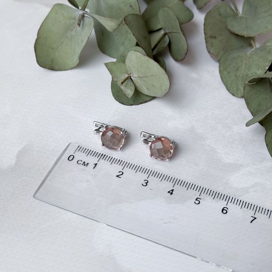 Silver earrings with 5.465 carats of sultanite