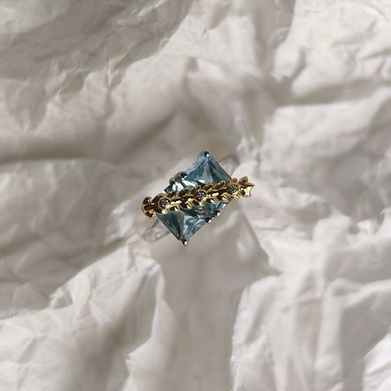 Silver ring with topaz, fianites