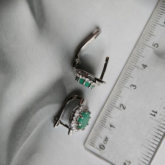 Silver earrings with emerald, fianites