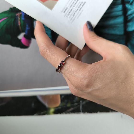 Silver ring with a garnet