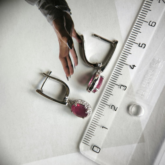 Silver earrings with a 4.171-carat ruby and cubic zirconia
