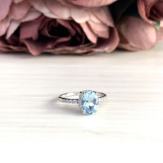 Silver ring with a topaz