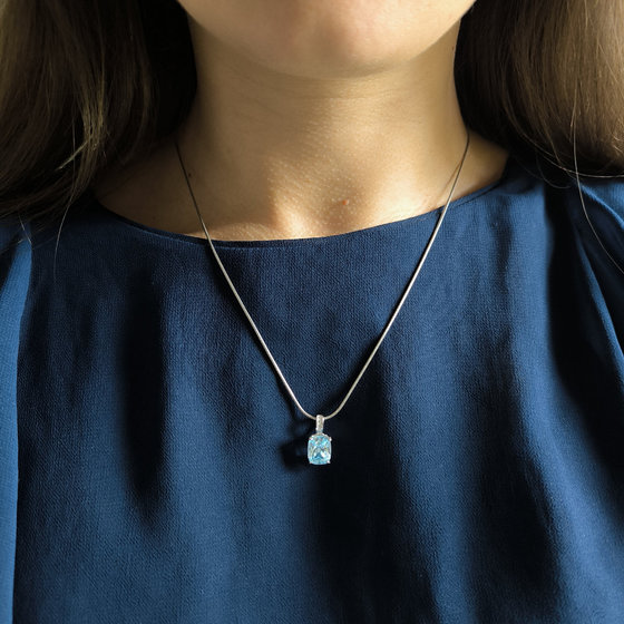 Silver pendant with a topaz and cubic zirconia