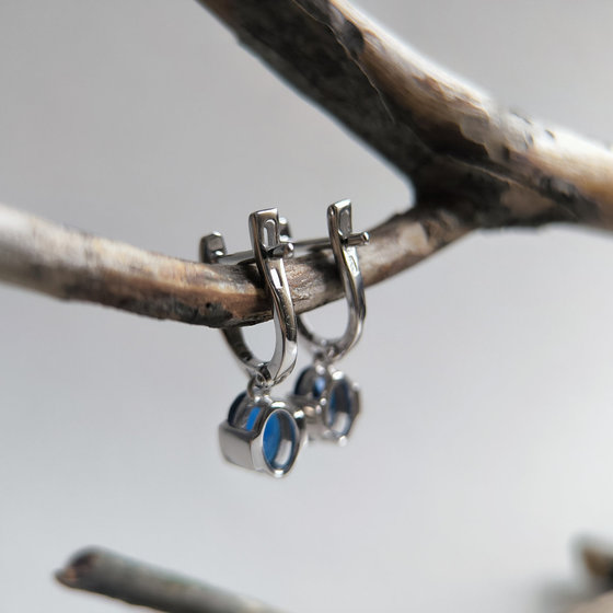 Silver earrings with a 1.825-carat nano sapphire