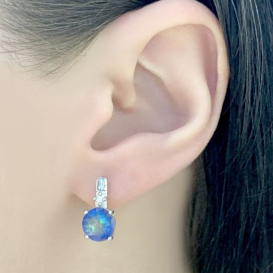 Silver earrings with a 3.94-carat mystic topaz