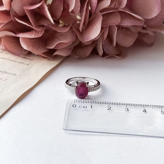 Silver ring with a ruby