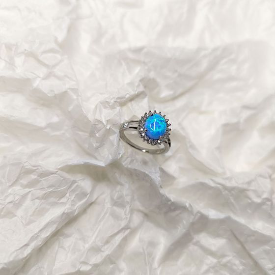 Silver ring with opal, fianites