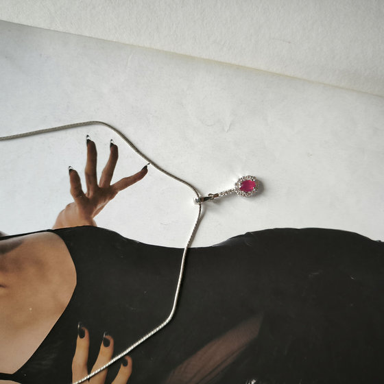 Silver pendant with a 1.113-carat ruby and cubic zirconia