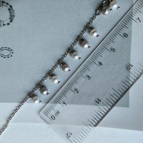 Silver bracelet with pearls