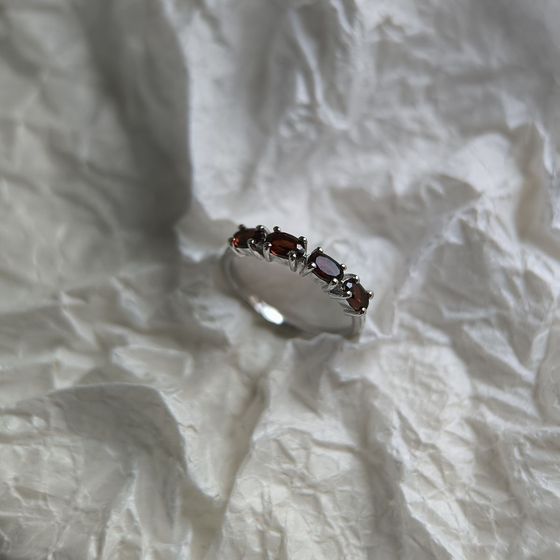 Silver ring with a garnet