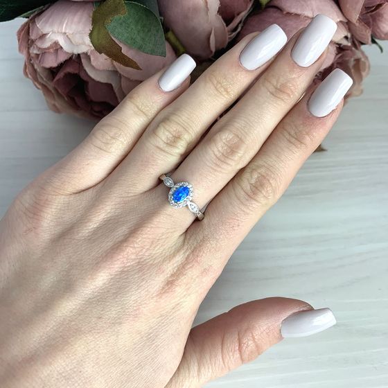 Silver ring with an opal