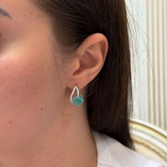 Silver earrings with emerald, fianites