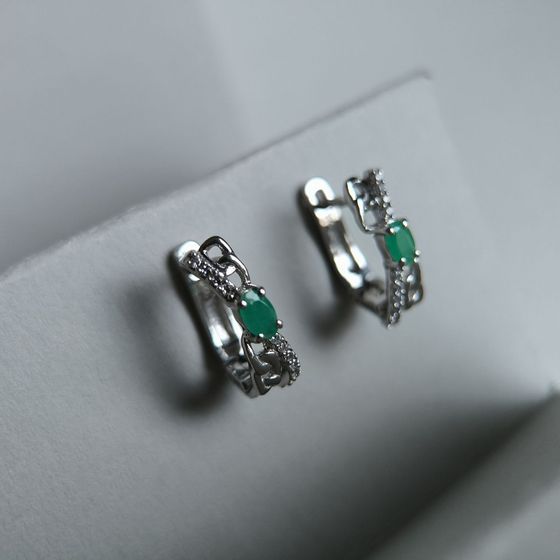 Silver earrings with emerald, fianites