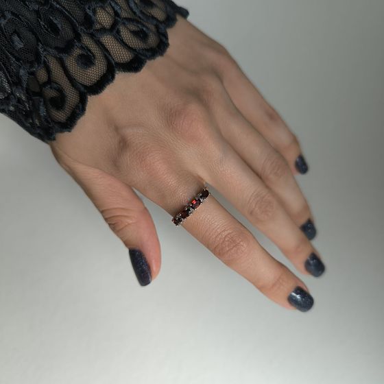 Silver ring with a garnet