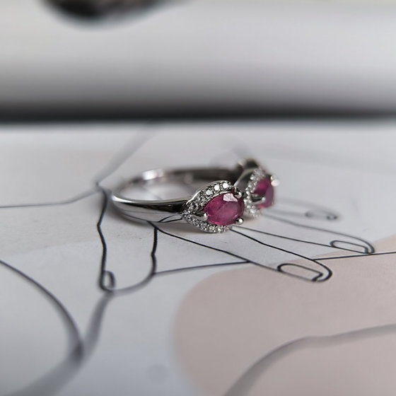 Silver ring with ruby and cubic zirconia